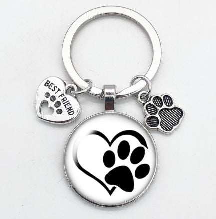 卸売愛猫ペットの足跡犬ガラス凸ラウンド金属キーホルダー
